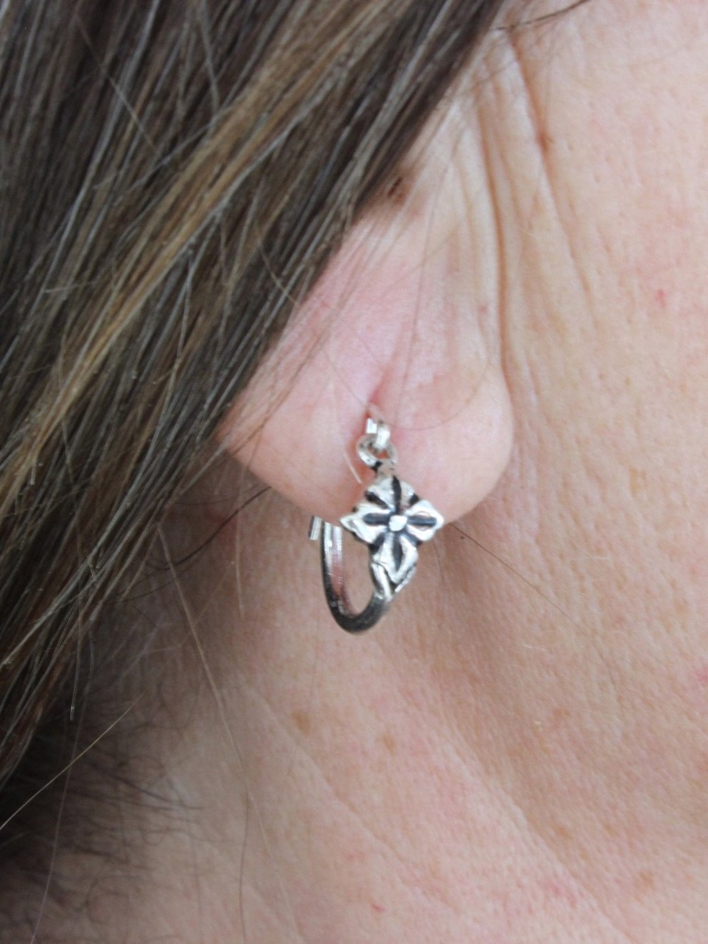 Silver hoop earring